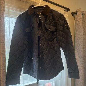 This navy blue jacket is in great condition and up for grabs at a steal!